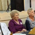 Na zdjęciu widoczne cztery członkinie KGW, które siedzą przy stole.